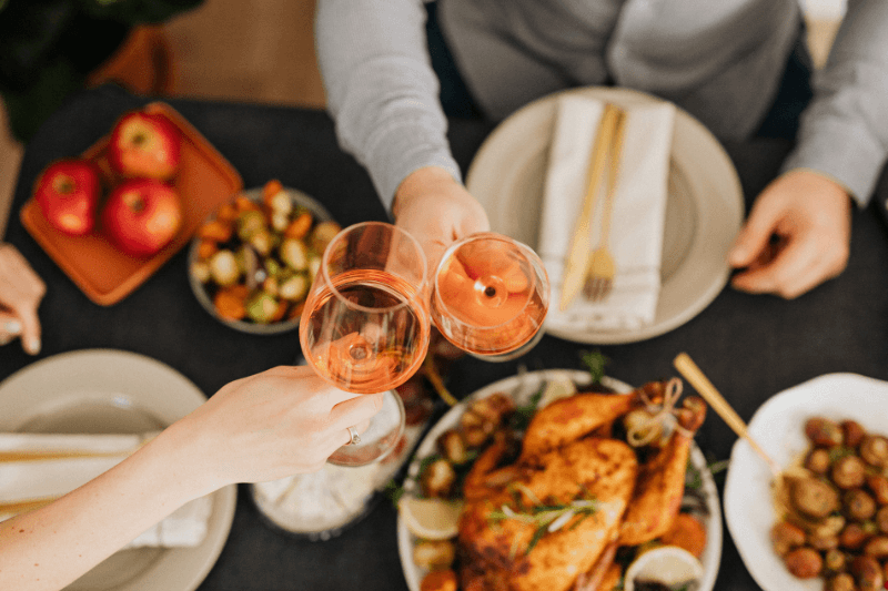 Wine toast with turkey dinner and holiday side dishes