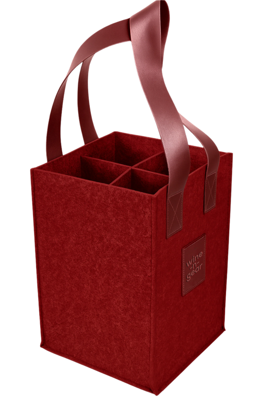 Red wine carrier with brown handles on a white background
